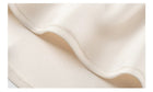 Beige One-Shoulder Draped Evening Maxi Dress - garment detail