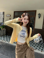 苏三三 红色针织开衫女氛围感秋季穿搭麻花复古毛衣外套上衣春秋