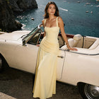 Women's ruched maxi dress with crisscross open back
