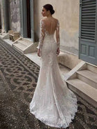 V-Neck Long-Sleeve Lace Mermaid Wedding Dress with Open Back - product photo 2