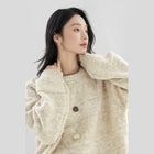 对白超好看异形扣绒感圆领毛衣女2025冬季新款韩系慵懒宽松针织衫