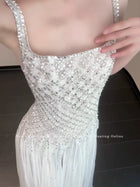 White Beaded Spaghetti-Strap Maxi Evening Dress — beaded neckline close-up