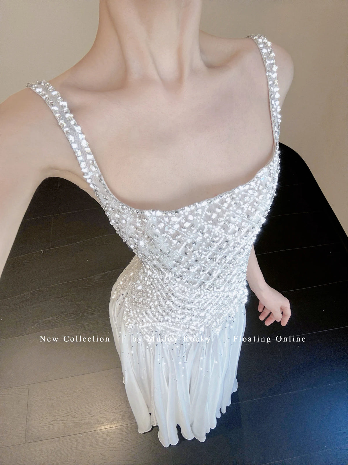 White Beaded Spaghetti-Strap Maxi Evening Dress — front view and flowing skirt