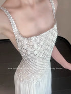 White Beaded Spaghetti-Strap Maxi Evening Dress — fitted embellished bodice